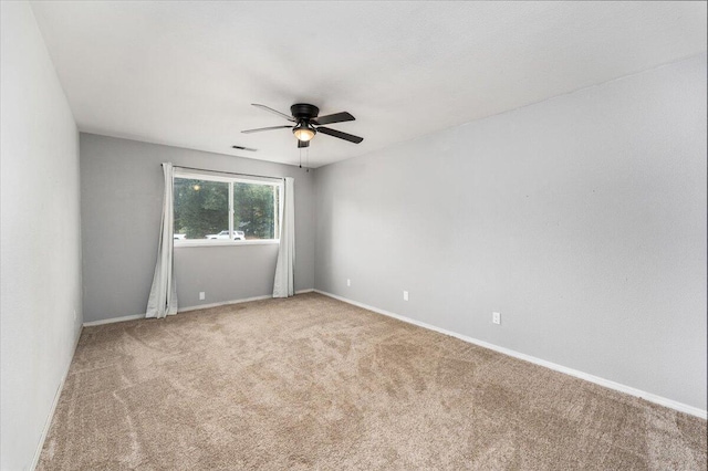 15540 China Rapids Dr, Red Bluff, CA 96080 - empty room featuring ceiling fan, carpet floors, and baseboards