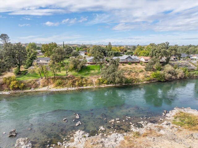 15540 China Rapids Dr, Red Bluff, CA 96080 - water view with a tree filled landscape and nearby suburban area