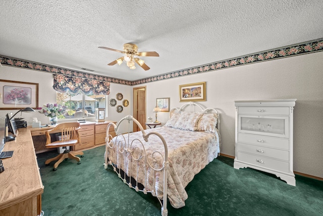 carpeted bedroom with a textured ceiling and ceiling fan