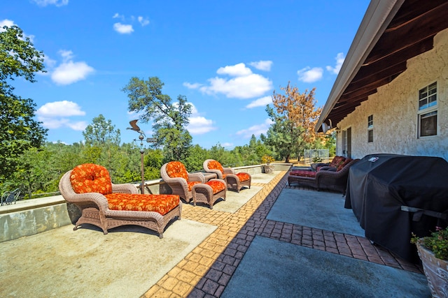 view of patio / terrace with outdoor lounge area and grilling area