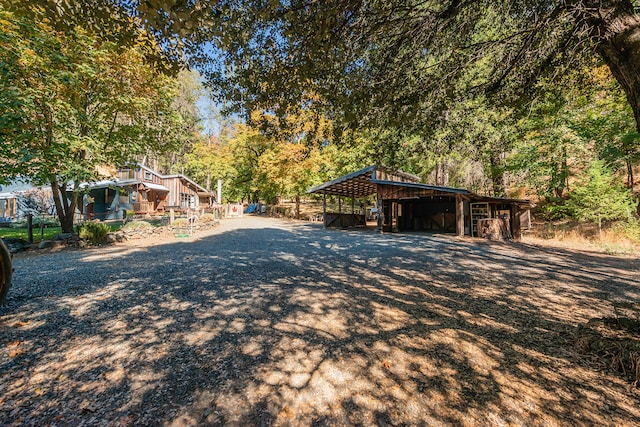 exterior space featuring a carport