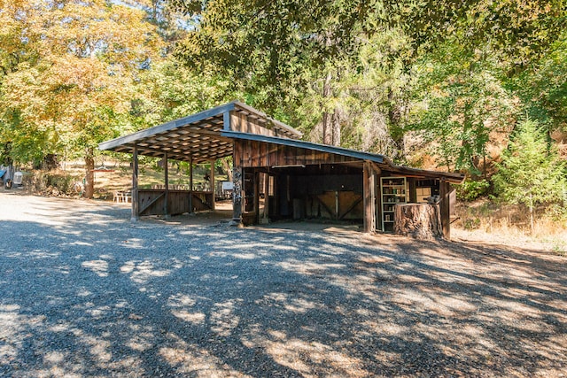 view of property's community featuring an outbuilding