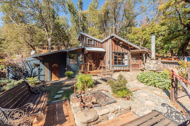 back of house featuring a patio