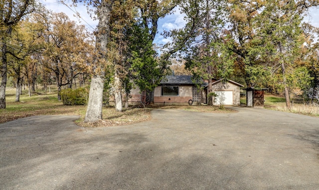 970 Branstetter Ln, Redding, CA 96001 - view of front of property featuring driveway and an attached garage
