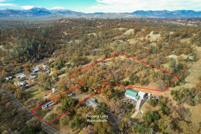 970 Branstetter Ln, Redding, CA 96001 - aerial overview of property's location featuring mountains, a heavily wooded area, and property parcel outlined
