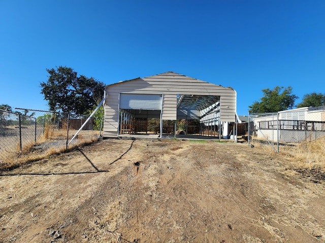 garage with a carport