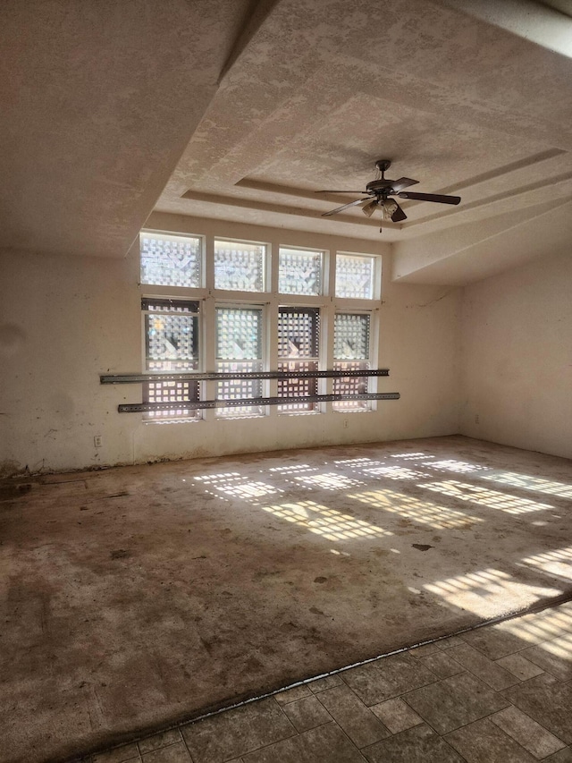 spare room with ceiling fan