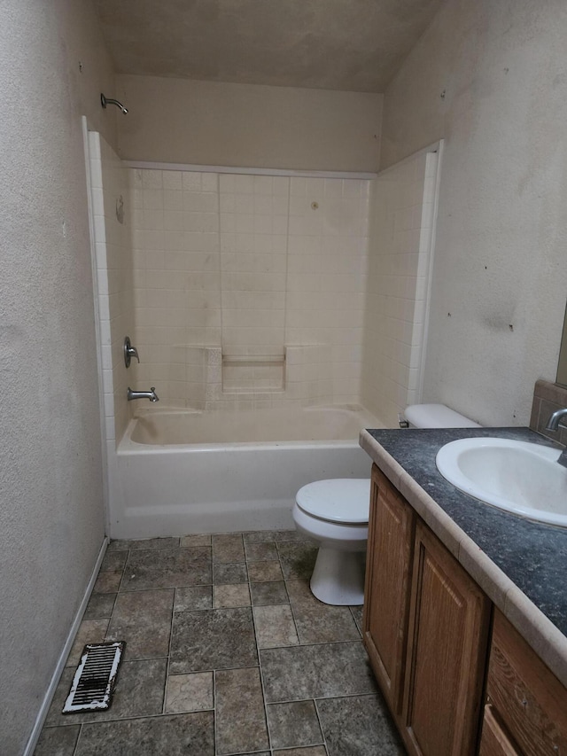 full bathroom with vanity, toilet, and shower / washtub combination