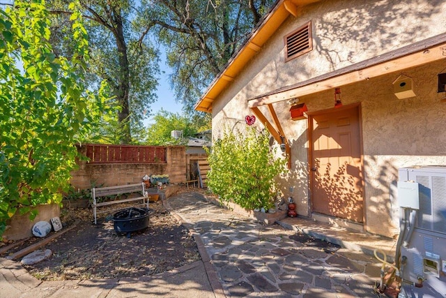 view of patio / terrace with a fire pit