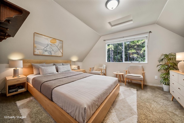 bedroom featuring light carpet and vaulted ceiling