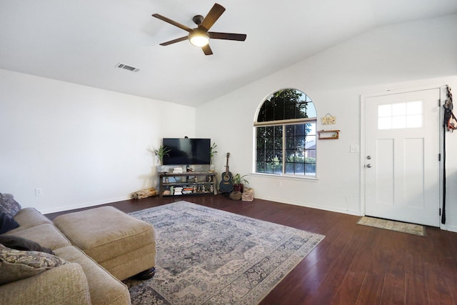 living room with lofted ceiling, dark hardwood / wood-style floors, and ceiling fan