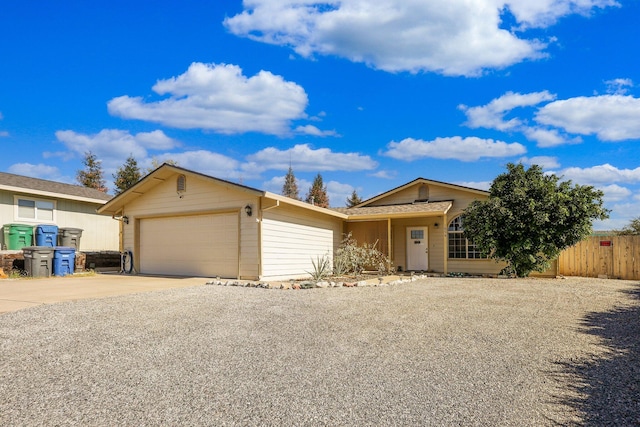 single story home featuring a garage