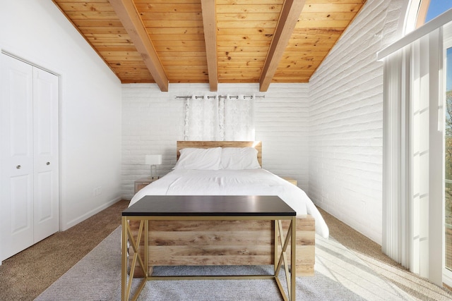 carpeted bedroom featuring wood ceiling, lofted ceiling with beams, a closet, and brick wall