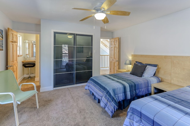 bedroom with ceiling fan and carpet floors