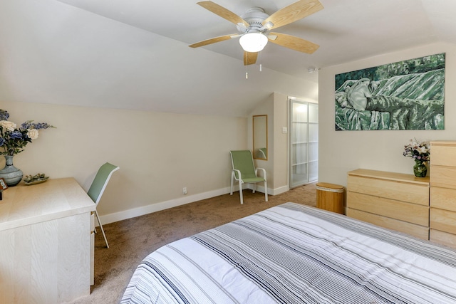 bedroom featuring vaulted ceiling, carpet flooring, and ceiling fan