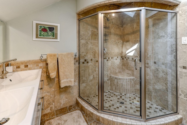 bathroom featuring vanity, tile patterned flooring, and an enclosed shower