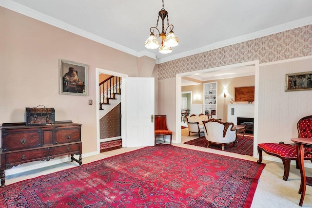 sitting room with light carpet, crown molding, a chandelier, and built in shelves