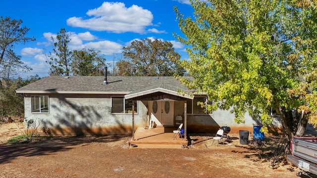 rear view of property with a patio area