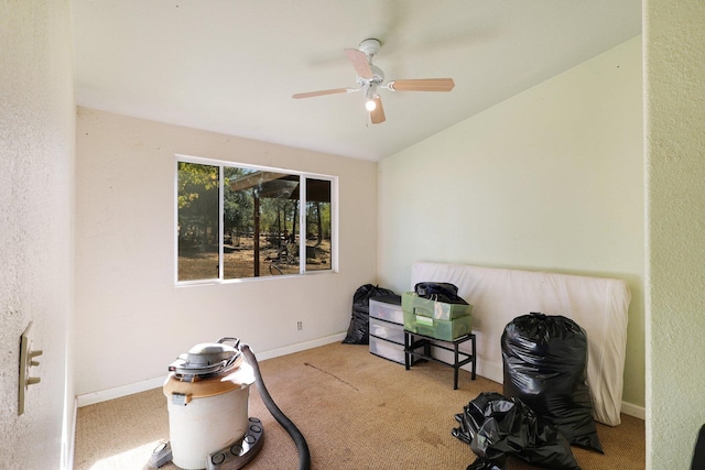 misc room featuring light carpet and ceiling fan