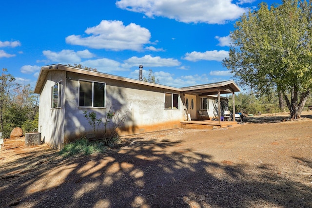 back of house with a patio area