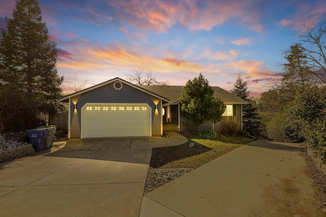 single story home with a garage