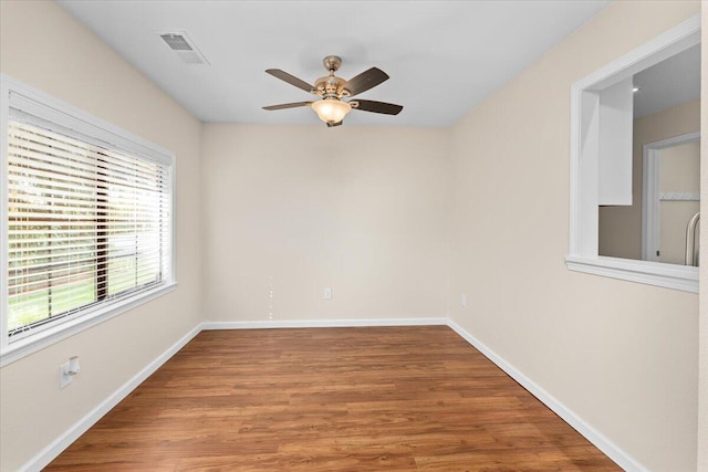 unfurnished room featuring ceiling fan and wood-type flooring