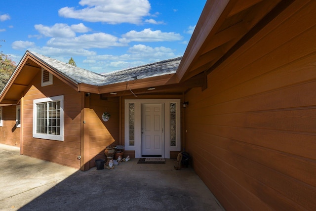 doorway to property featuring a patio