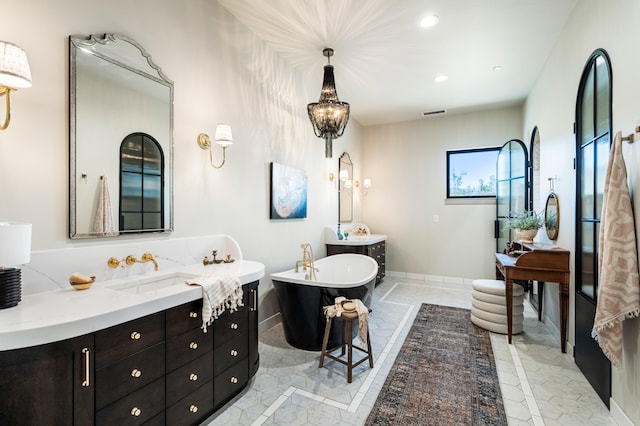 bathroom featuring vanity and a bathtub