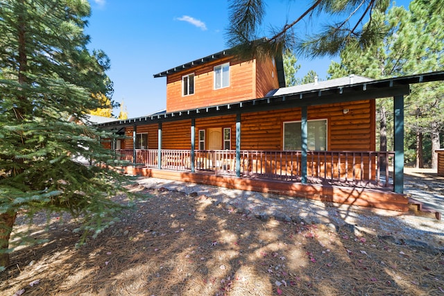 view of log-style house