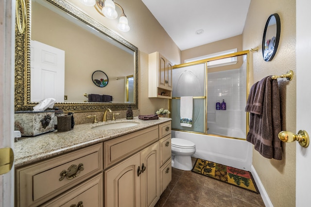 full bathroom with tile patterned flooring, vanity, toilet, and enclosed tub / shower combo