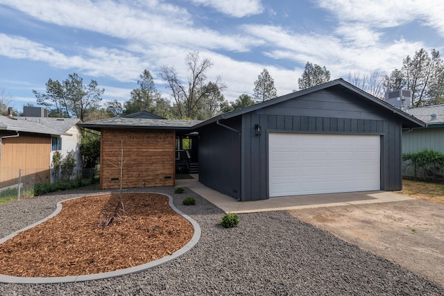 ranch-style home with a garage