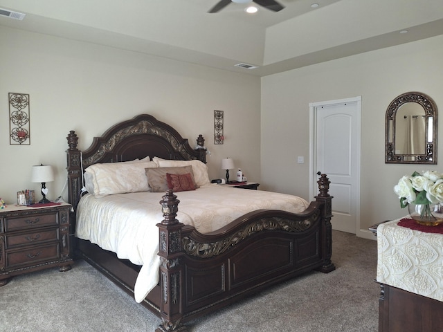 bedroom featuring light carpet and ceiling fan