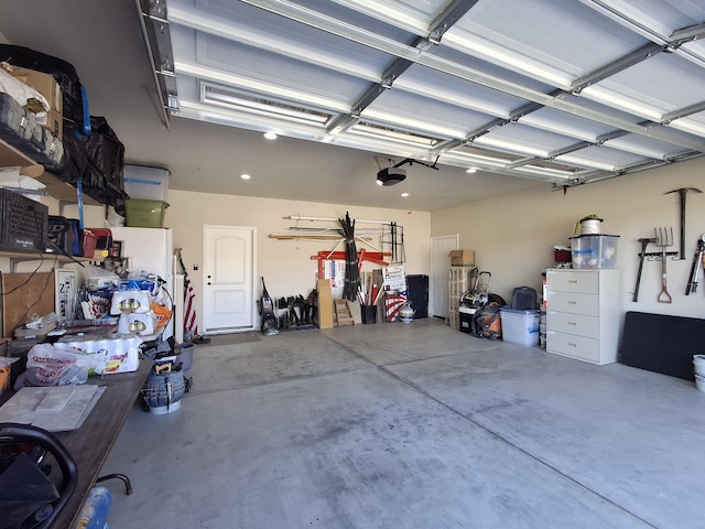 garage featuring a garage door opener