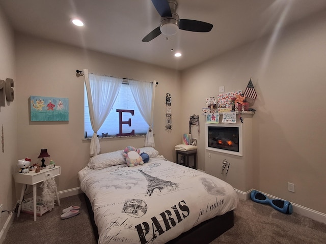 carpeted bedroom with ceiling fan