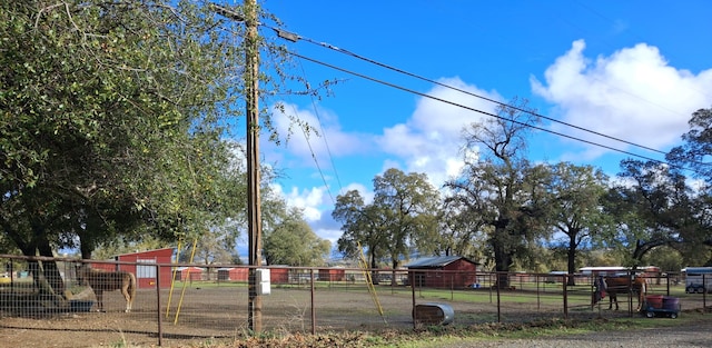 view of yard featuring a rural view