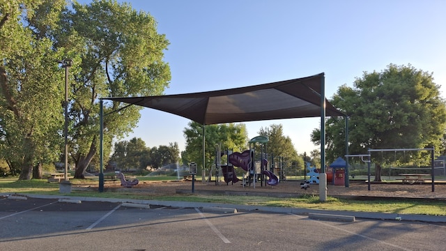 view of property's community with a playground