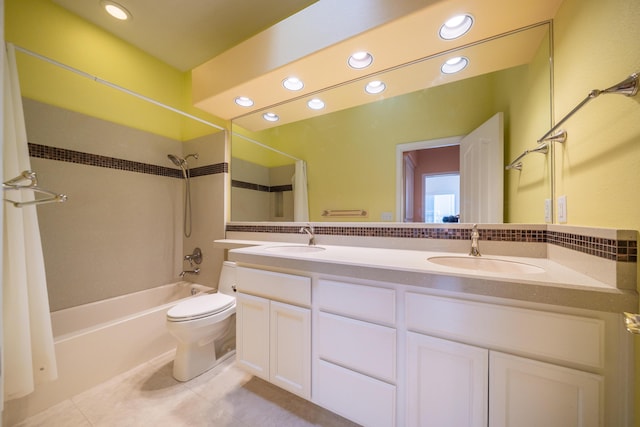 full bath with shower / bath combination with curtain, tile patterned flooring, a sink, and toilet