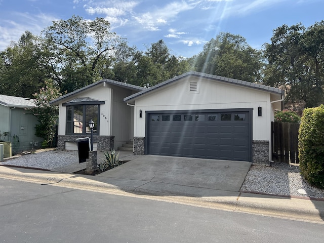 ranch-style home with a garage