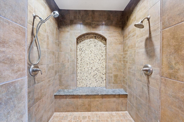 bathroom featuring tiled shower