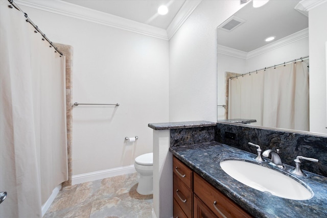 bathroom with ornamental molding, vanity, tasteful backsplash, and toilet