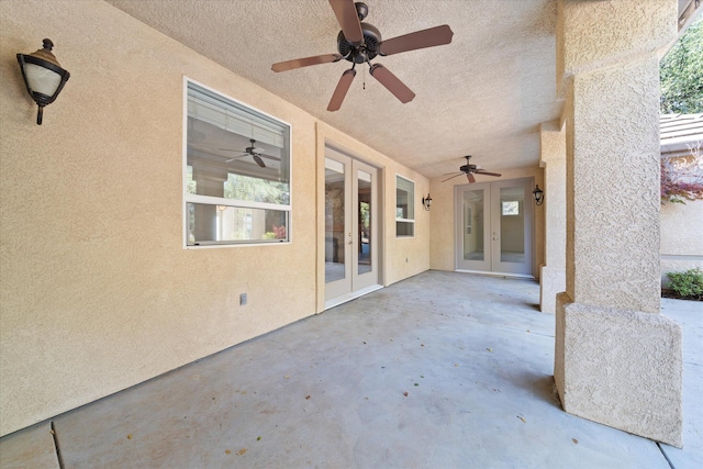 view of patio / terrace with ceiling fan and french doors