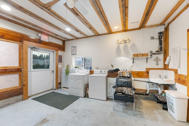 clothes washing area with ceiling fan and washing machine and clothes dryer