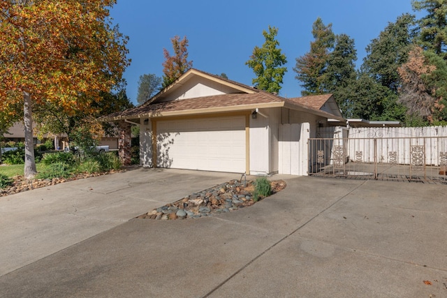 single story home with a garage