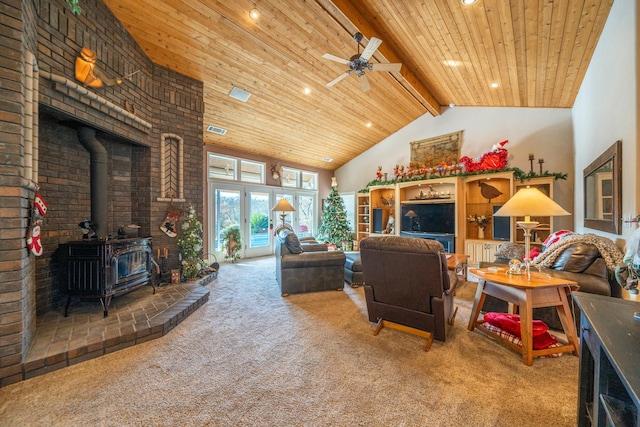 living room featuring carpet, wood ceiling, high vaulted ceiling, beamed ceiling, and a wood stove