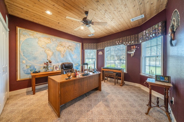 home office featuring ceiling fan, light carpet, and wooden ceiling