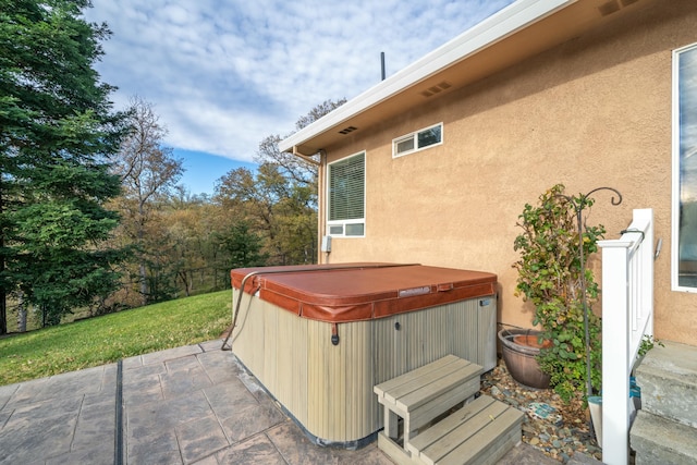 view of patio featuring a hot tub