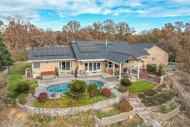 back of house with a patio area