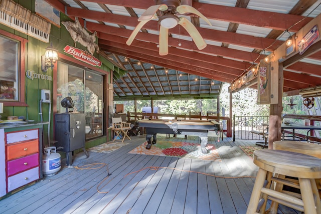 wooden terrace featuring ceiling fan