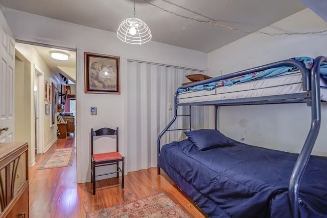 bedroom with hardwood / wood-style flooring