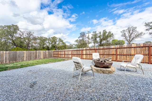 view of patio featuring a fire pit